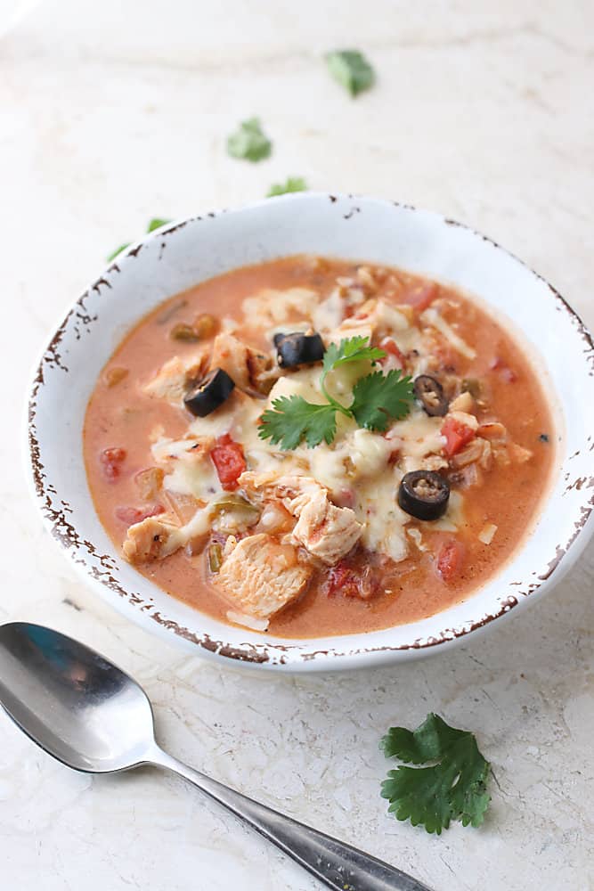 A bowl of Chicken and Rice soup with a southwest flair
