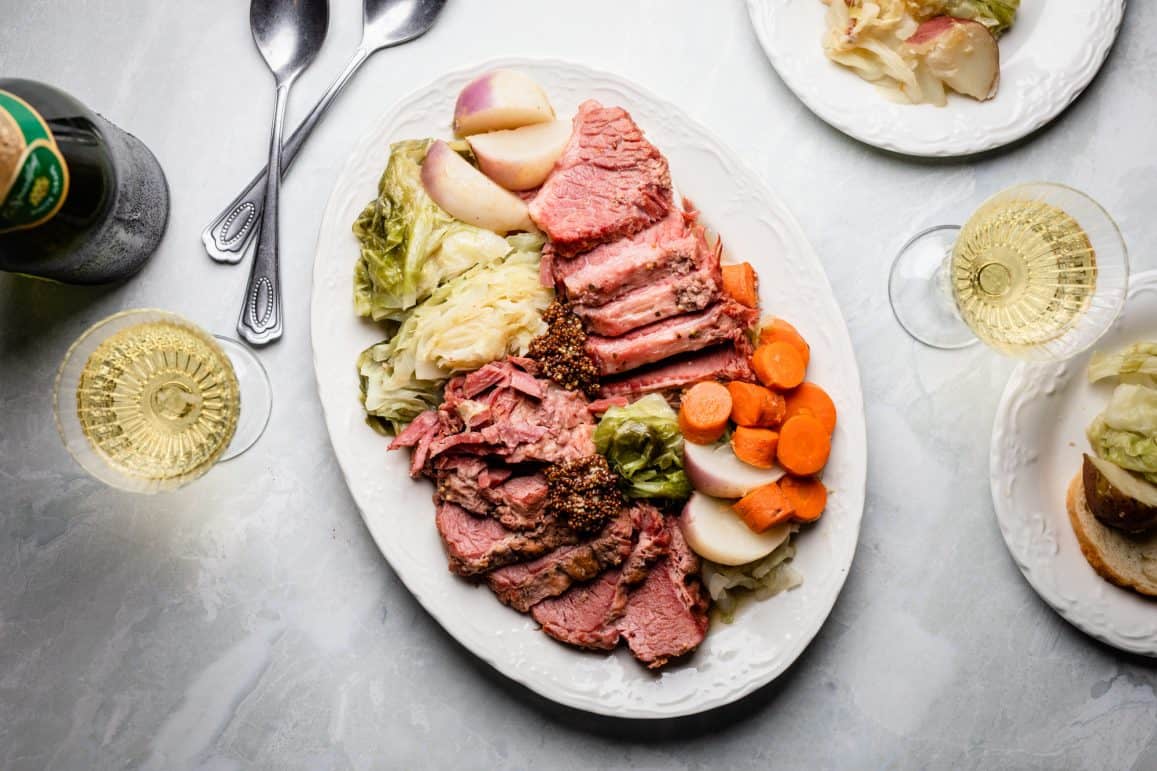 A dinner spread of corned beef and cabbage made in the instant pot
