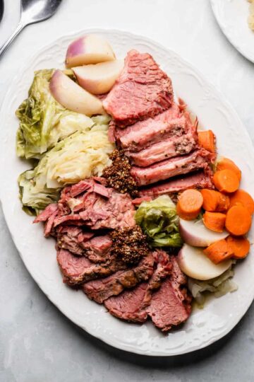 A dinner spread of corned beef and cabbage made in the instant pot