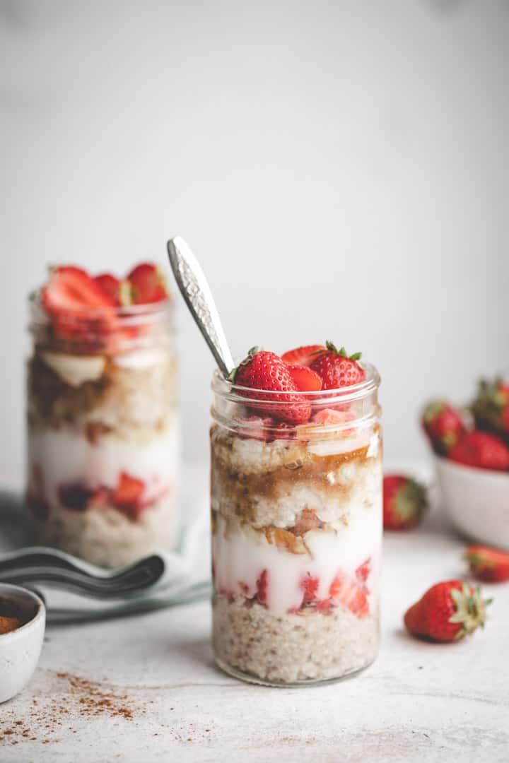 An oatmeal parfait with leftover oatmeal, yogurt, berries and almonds.