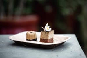 foie mousse bites on a bamboo plate