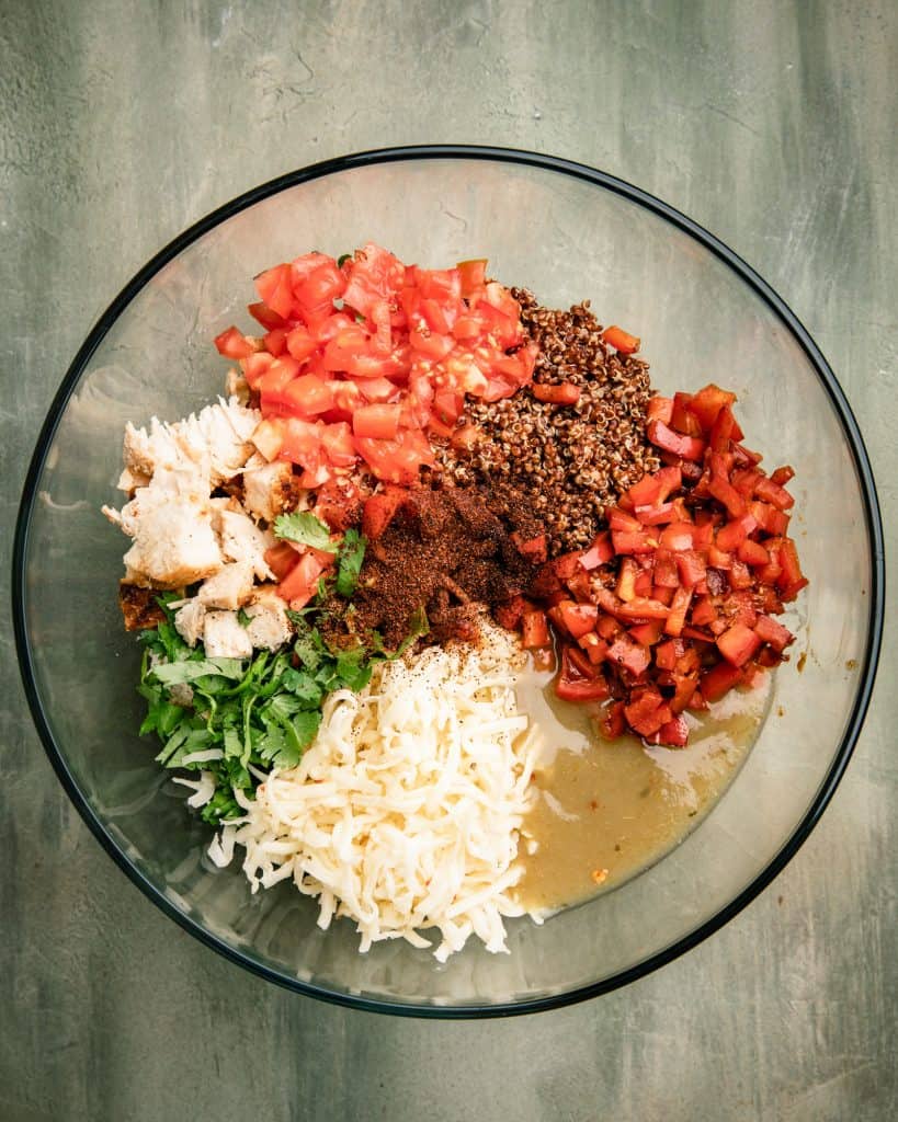 filling ingredients for chicken stuffed poblano peppers in a bowl seen from the overhead position