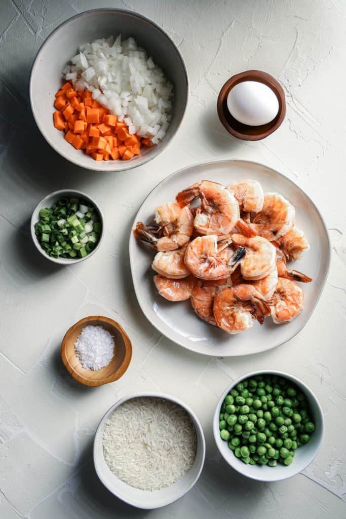 Overhead view of ingredients for shrimp fried rice