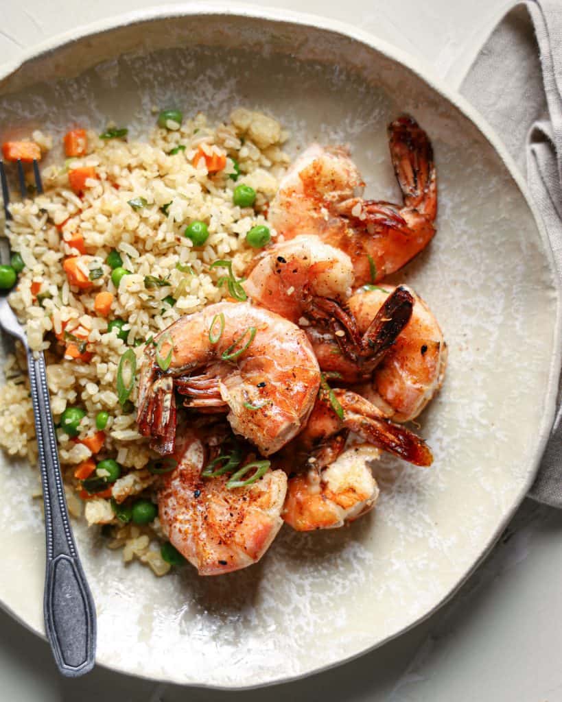 Overhead view of a plate with shrimp fried rice