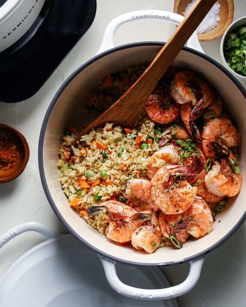 An overhead view of a pot of shrimp fried rice 