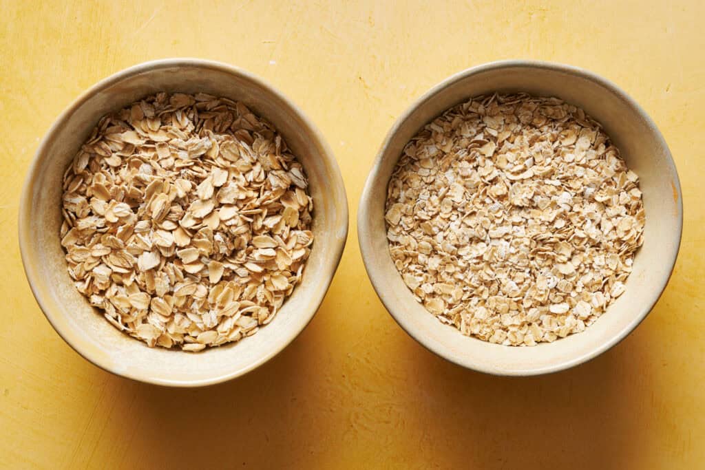 Image of dry oats. Quick cooking oats are pictured on the right and old fashioned oats on the left.