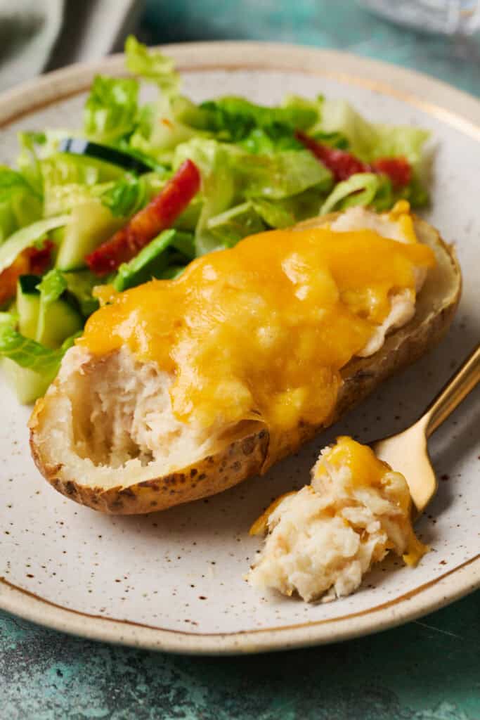tuna baked potato with a bite taken out