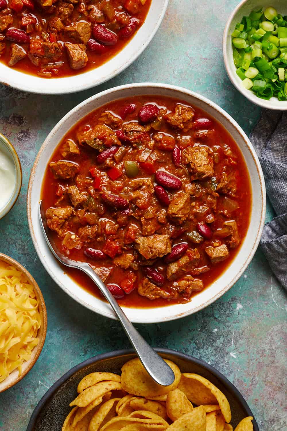 chili in a bowl with a spoon