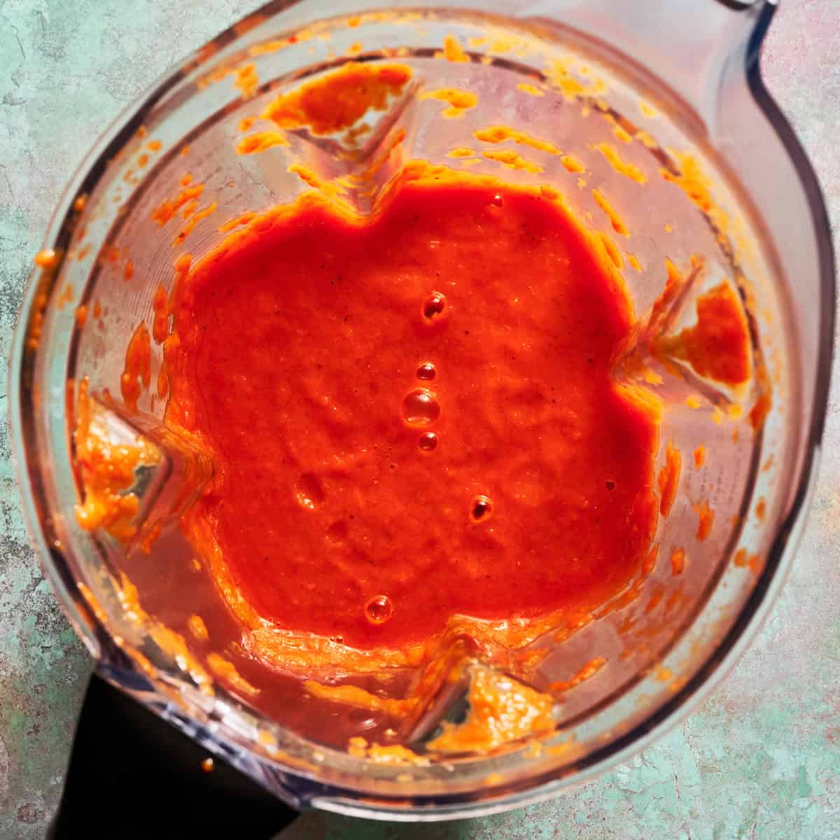 blending the roasted veggies into a sauce