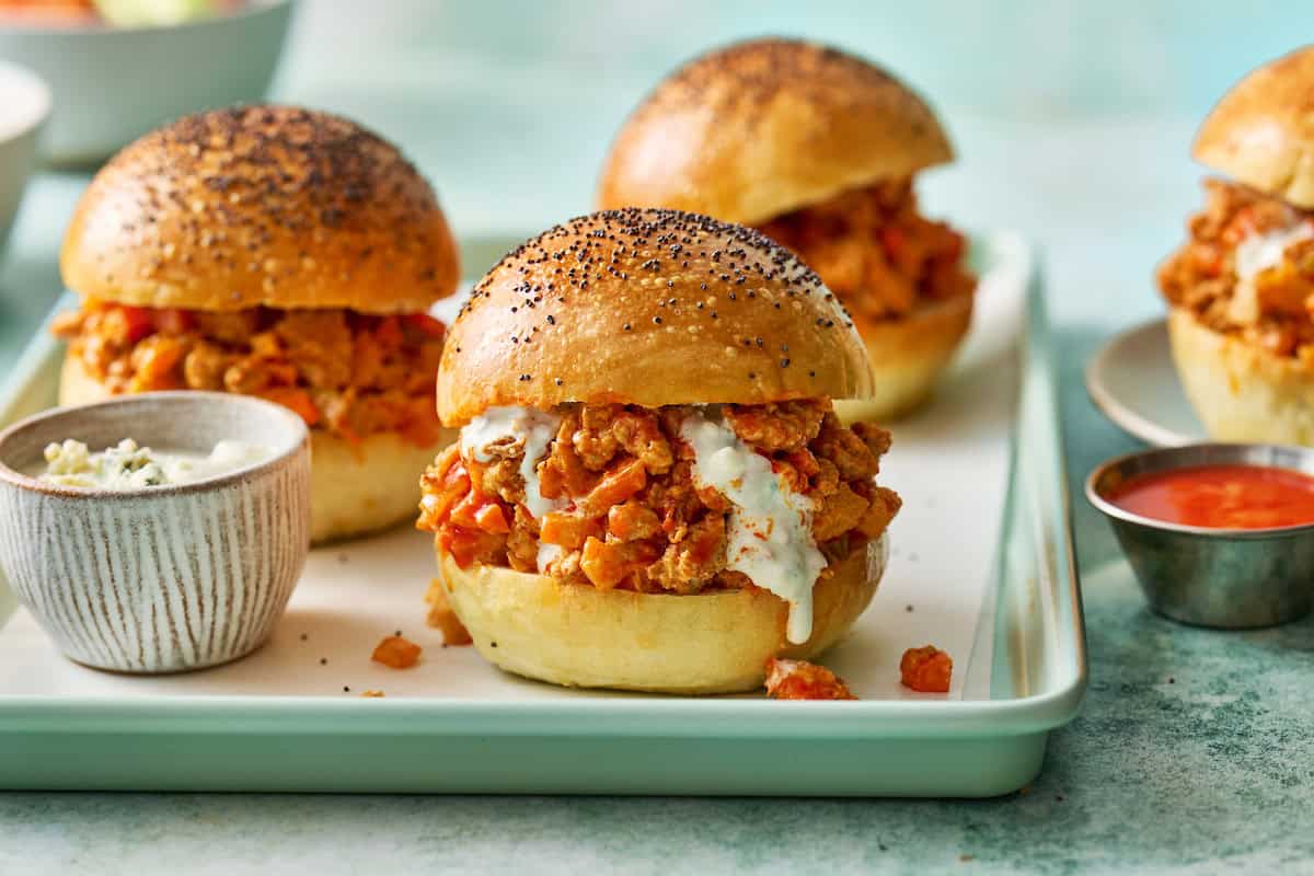buffalo chicken sloppy joes on homemade sourdough rolls with blue cheese dressing