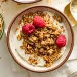 buckwheat granola on top of yogurt with berries