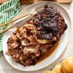 pork shoulder roast with shreds and ready to serve on slider buns