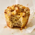unwrapped muffin with a bite taken out