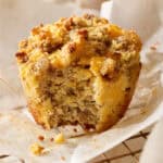 unwrapped muffin with a bite taken out