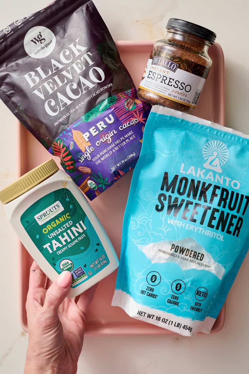 ingredients for mug brownies including monkfruit, instant espresso, black cacao and tahini