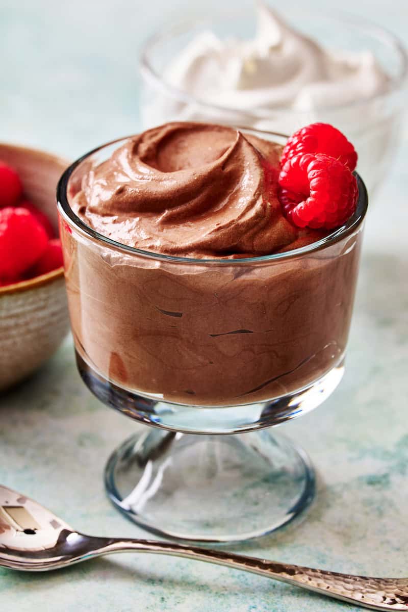 cottage cheese chocolate mousse in a glass with raspberries on the side